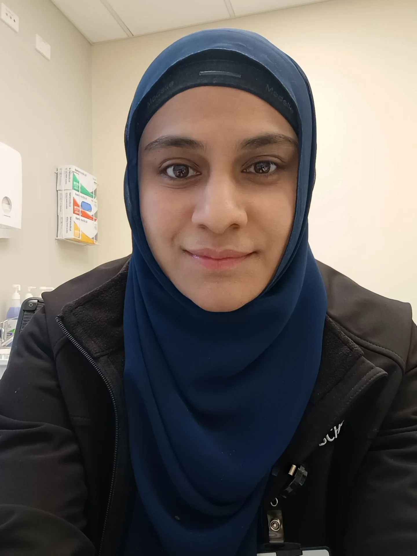 Nazreen Nakeeb, Accredited Practising Dietitian, in a clinical office setting
